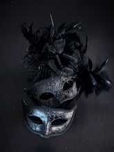 Couples masquerade mask with feathers in black for sale.