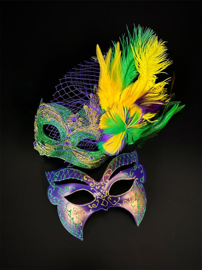 Couples masquerade masks in green, gold, and purple. The women's mask has feathers.