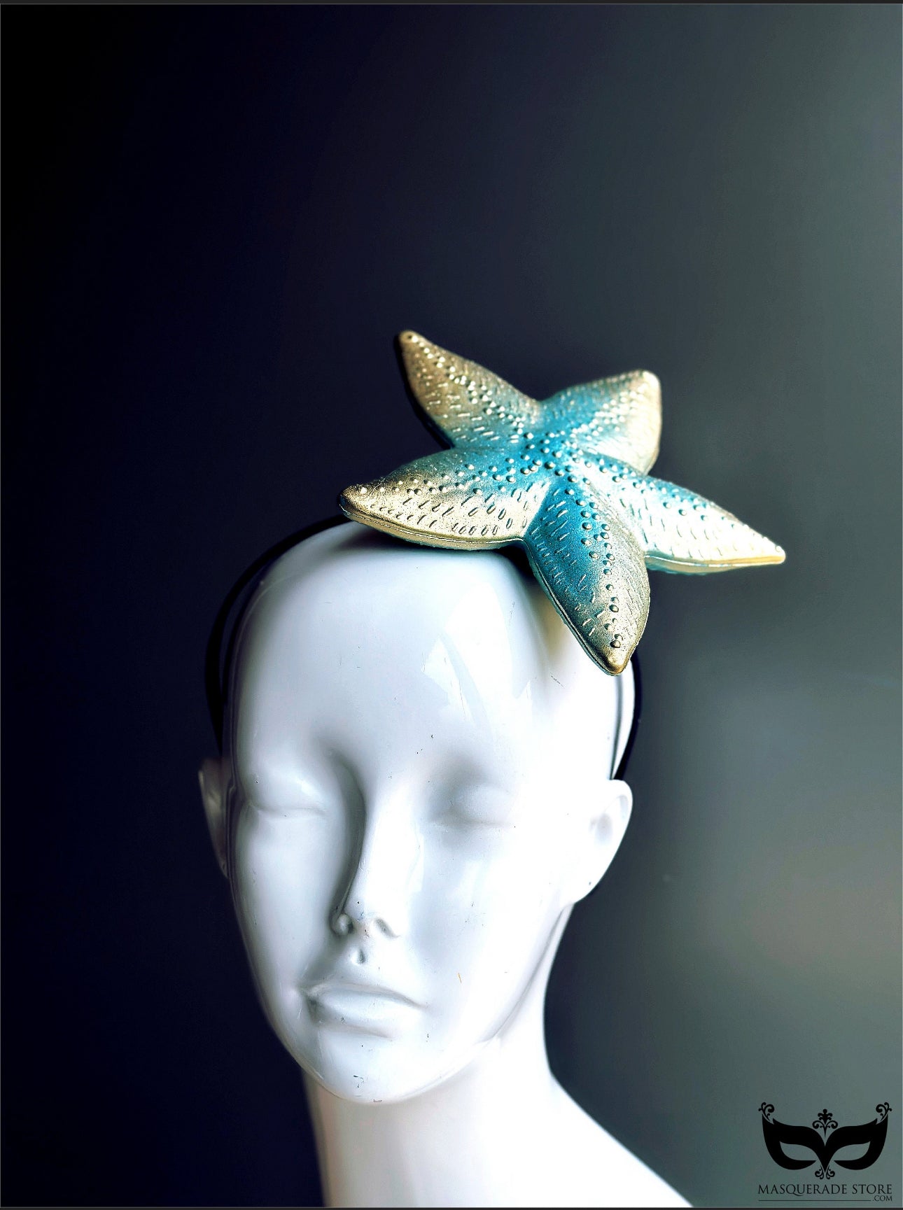 Starfish fascinator headpiece in gold and turquoise.