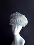 captains hat with silver sequins, iridescent crystals, and pearls with "bride" on the front.