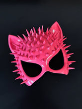 Womens masquerade mask in a pink Cat Woman style with spikes.