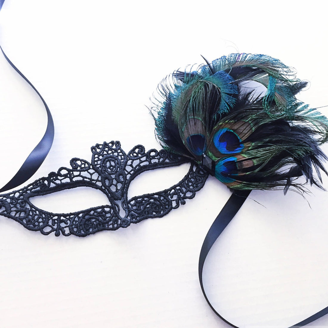 Black lace mask with peacock feathers/