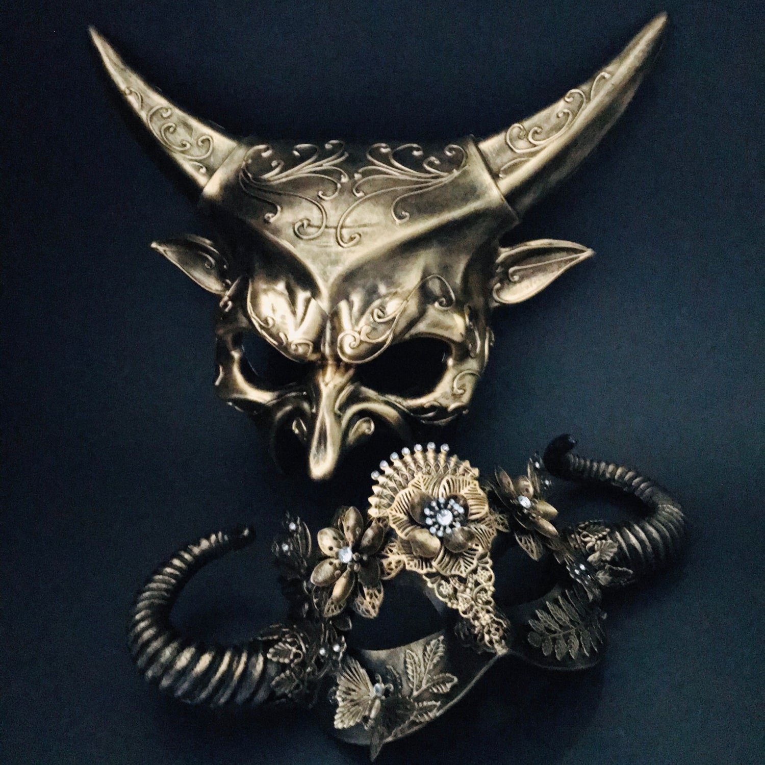 Couples set of Baphomet-inspired and ornate floral masquerade masks