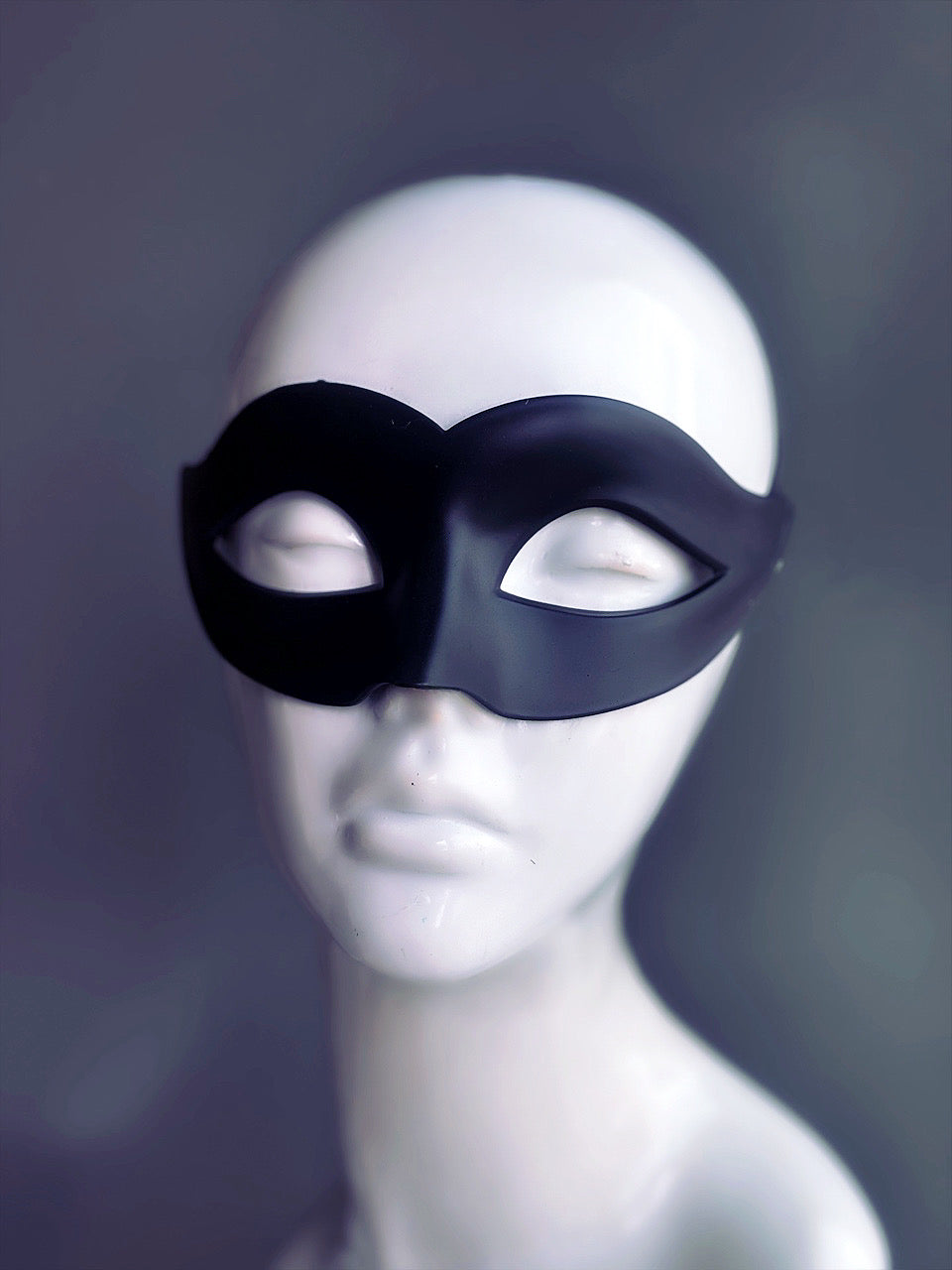 Black classic mask for women with sleek and minimalist designs, perfect for formal events or costumes