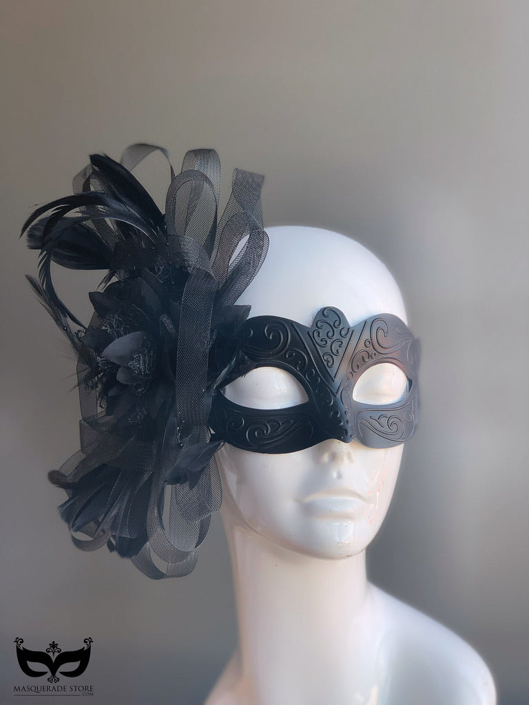 Black masquerade mask with feathers and tulle accents