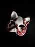 Bloody white therian mask with red-stained details, ideal for Halloween or horror-themed costumes.