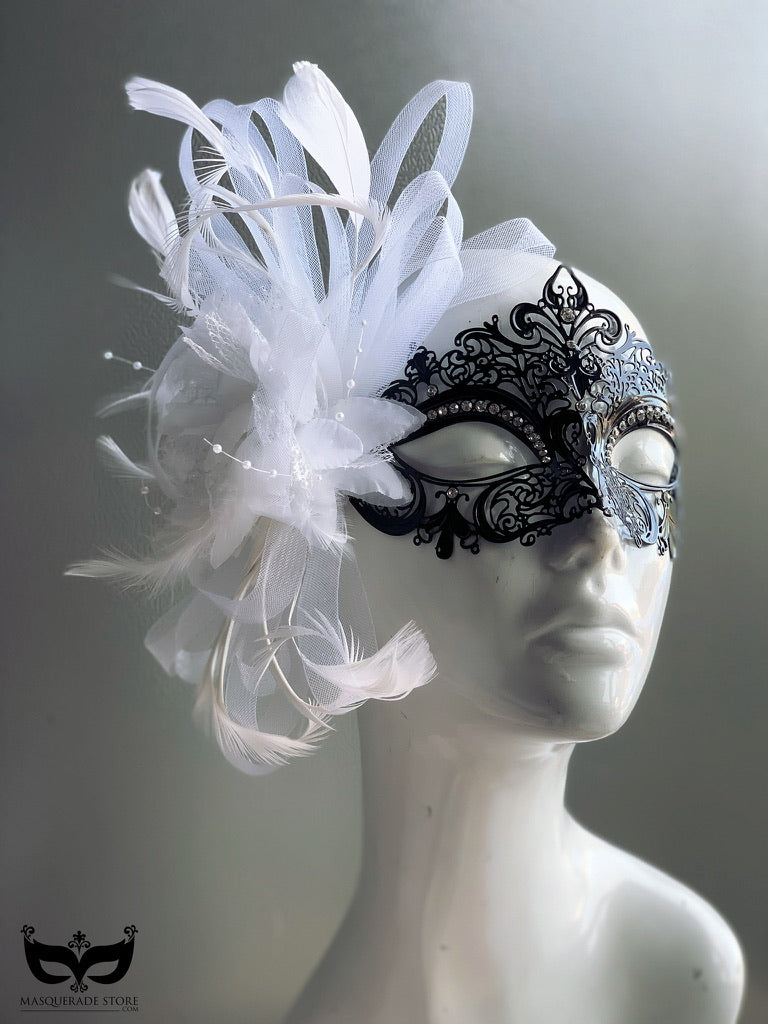 Elegant Venetian Metal Mask with black filigree, feathers, tulle, and decorative brooch