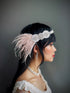 Ivory flapper headband with beaded crystal design and feathers, perfect for Gatsby-themed parties and elegant occasions.

