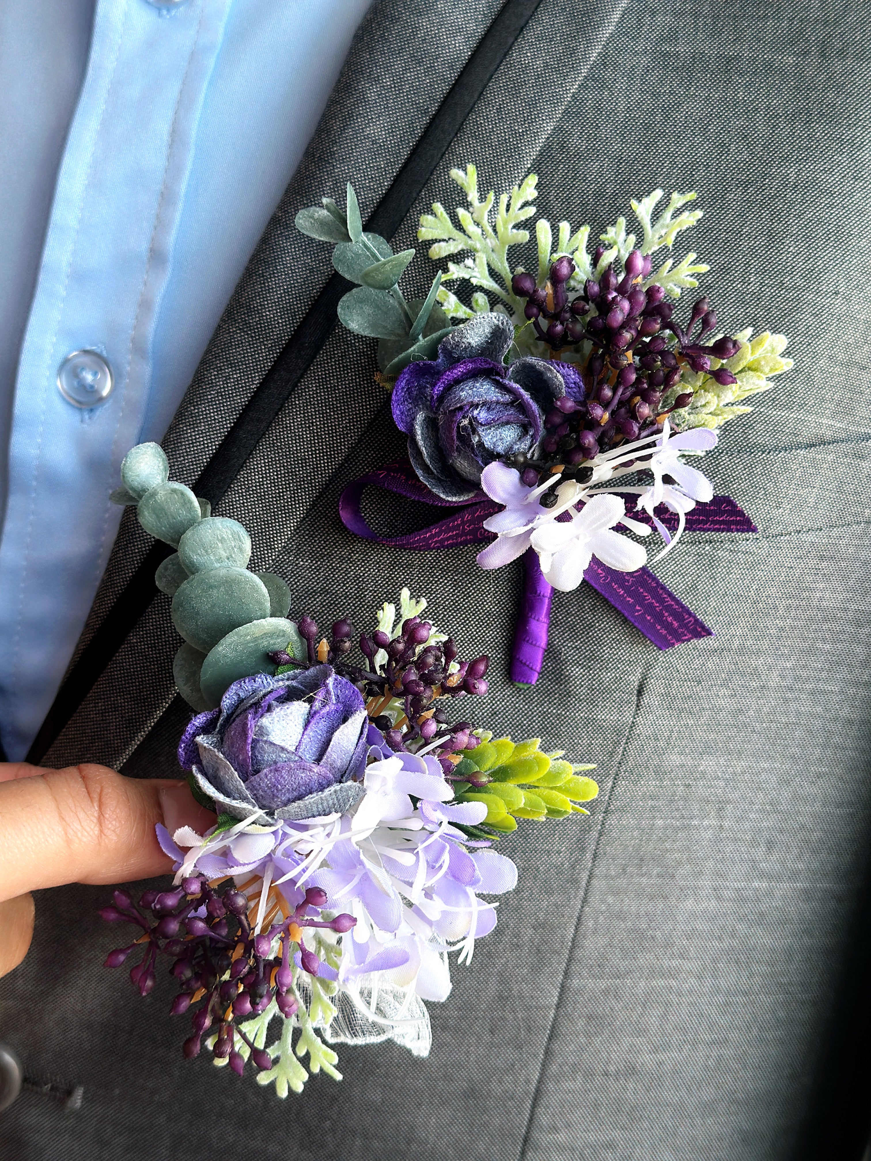 Midnight Bloom prom boutonniere and corsage set in shades of purple, lavender, and green, perfect for a stylish and elegant prom look.