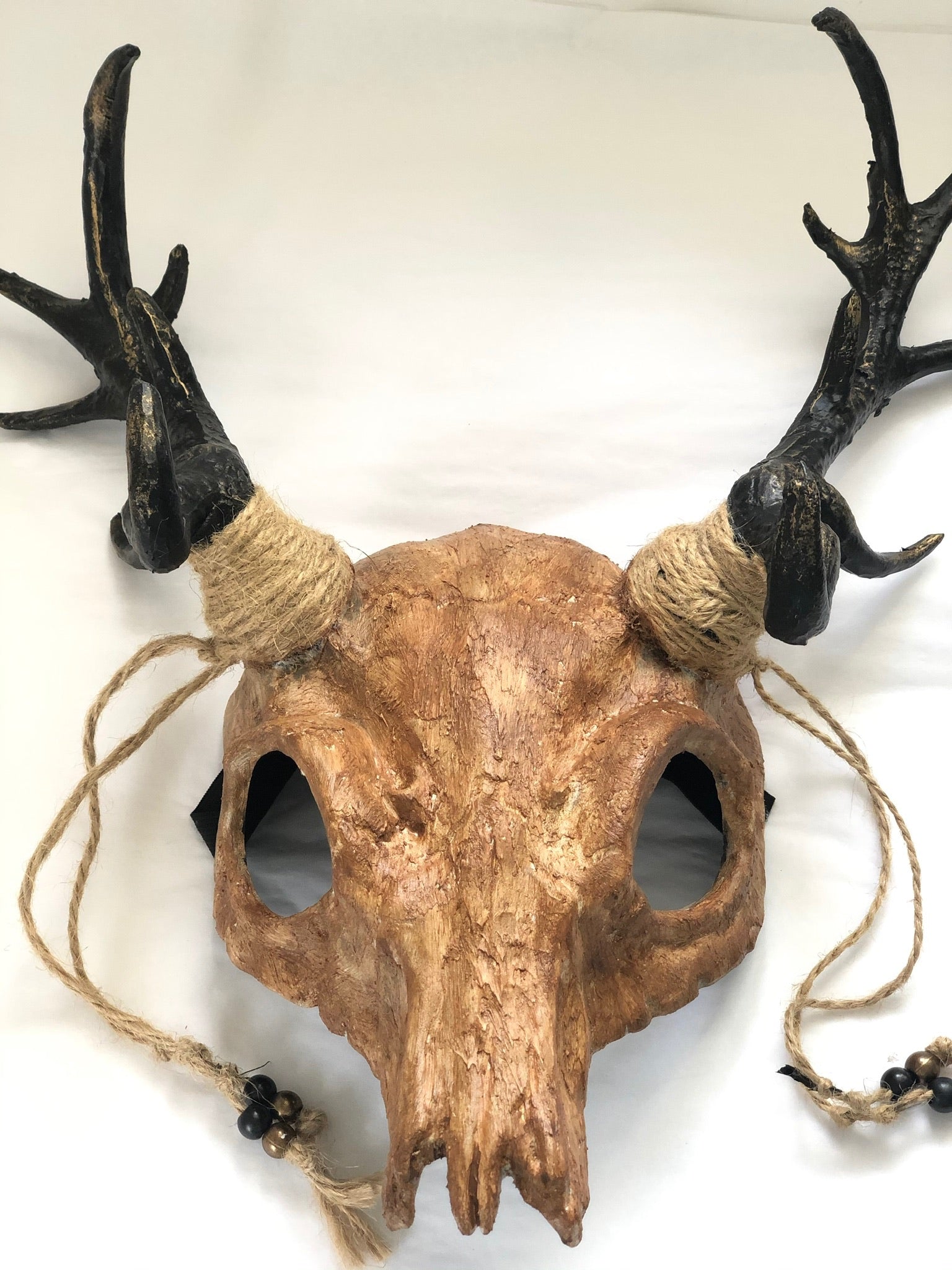 Norse hunter antler skull headdress with handcrafted details, twine-wrapped antlers, and a rustic finish for a warrior-inspired look.