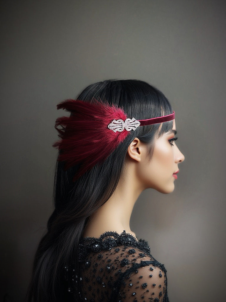 Vintage-inspired red feather and velvet headband with rhinestone accents, ideal for Gatsby parties and formal events.