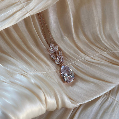 Rose Gold Cascade Droplet Necklace with a pear-shaped zircon drop and marquise-cut vine design