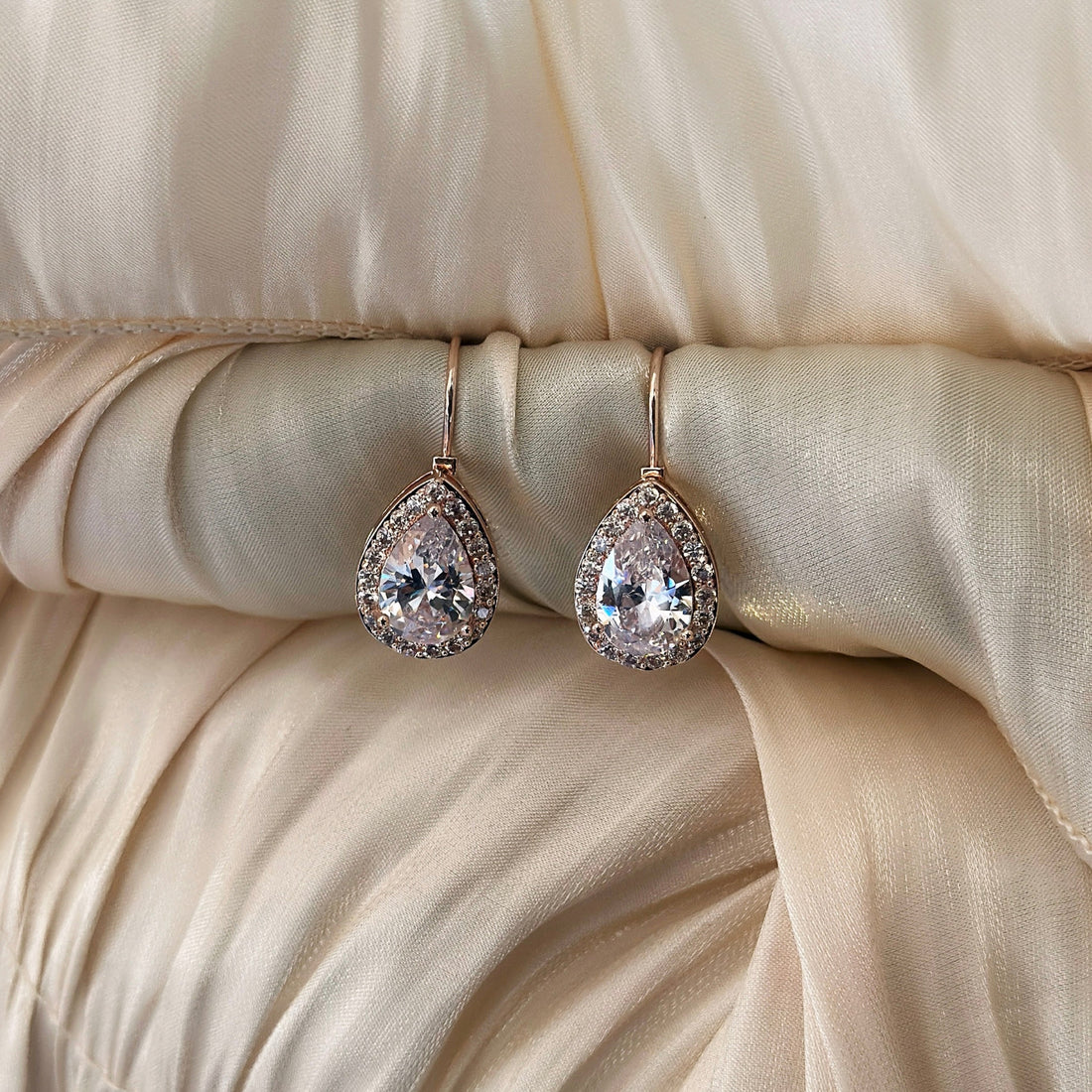 Rose Gold Halo Teardrop Earrings with sparkling zircon accents