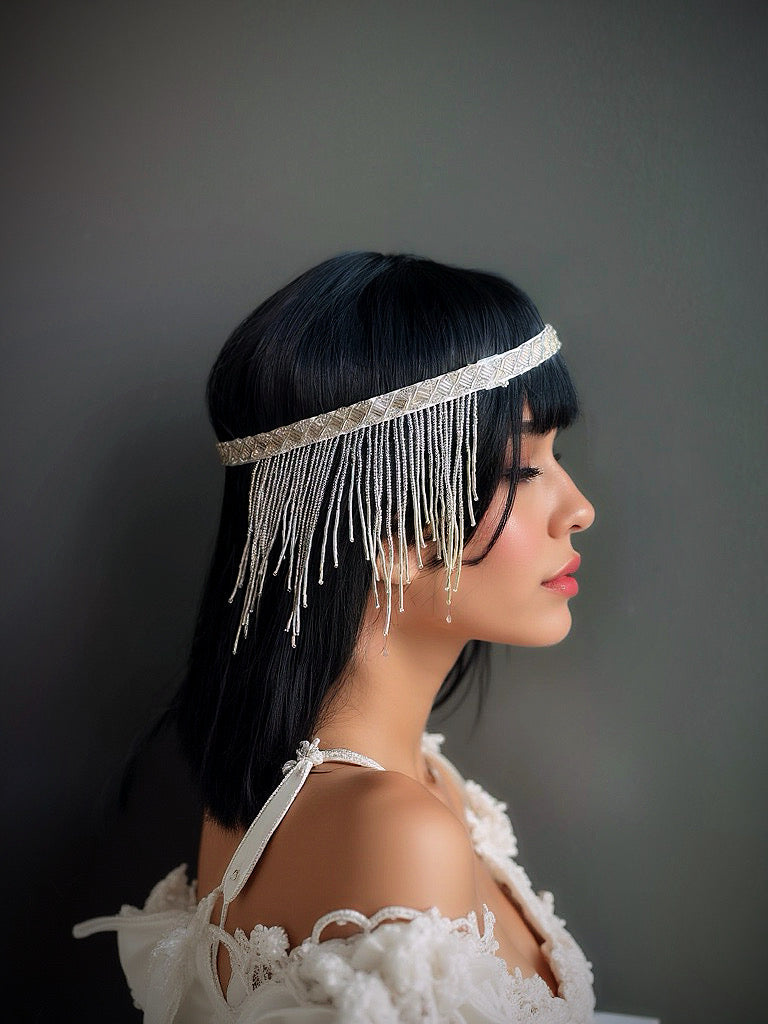 Silver fringe flapper headband with Art Deco design, perfect for Gatsby-themed events and formal occasions.

