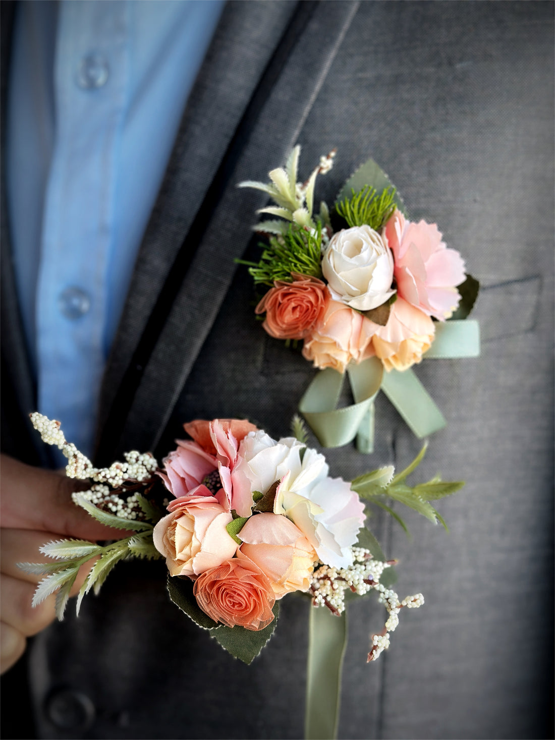 Elegant prom boutonniere and corsage set with soft florals and lush greenery.