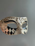 Venetian mask with antique crackle finish, scrollwork detailing, and black and silver harlequin patterns, ideal for masquerades and formal occasions.

